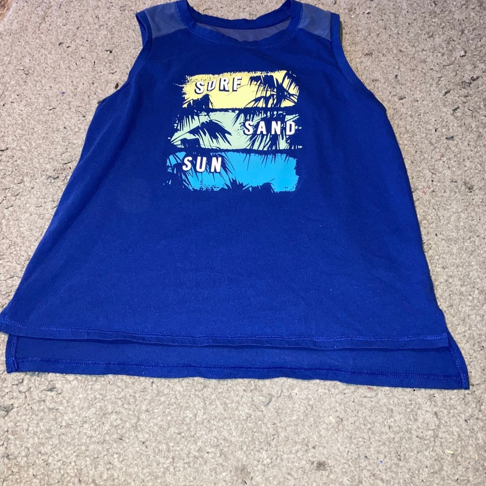 A blue graphic tank top with open back.